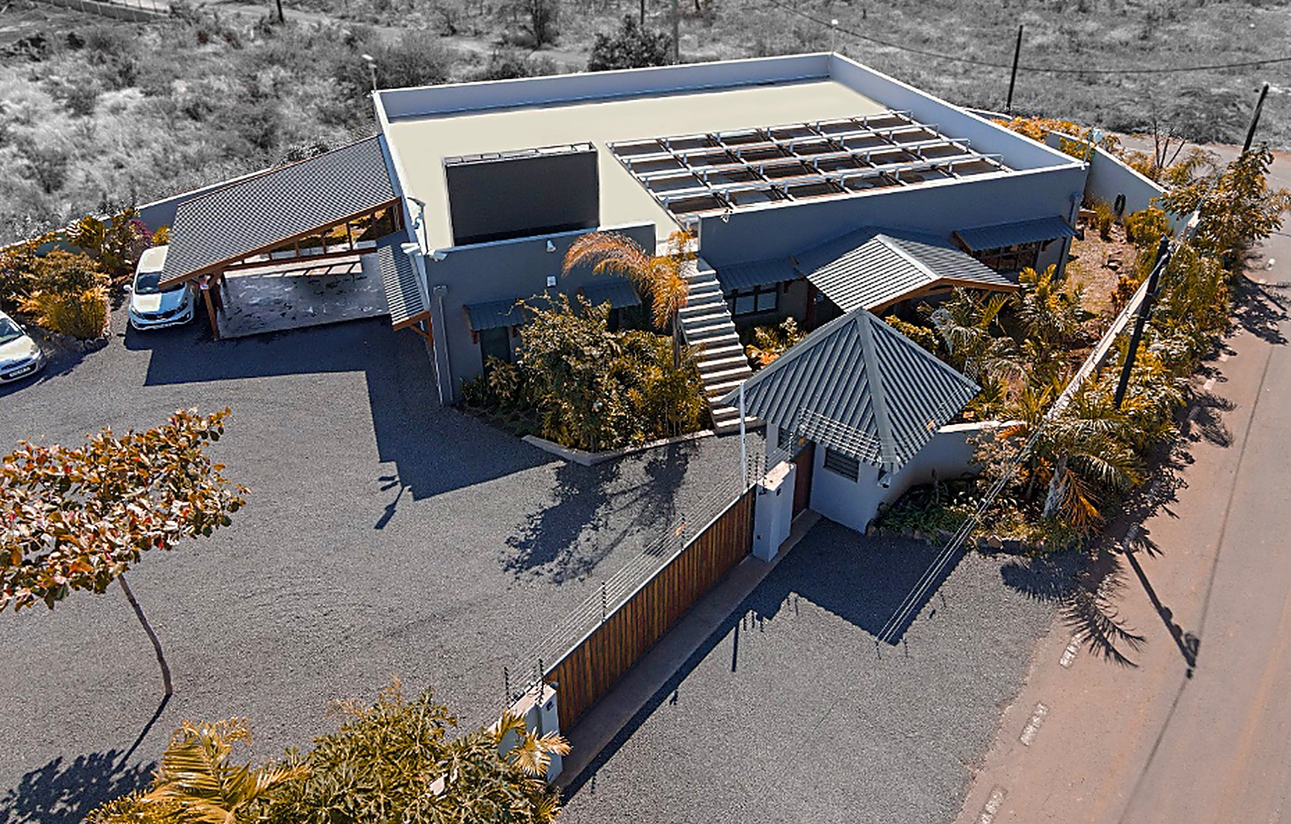 Aerial view of the Solarex headquarters in La Tour Koenig, Pointe aux Sables, with its rooftop solar installation